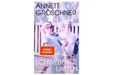 Buchcover "Schwebende Lasten". Autorin: Annett Gröschner. Verschwommened Foto von zwei Frauen mit einem Kind